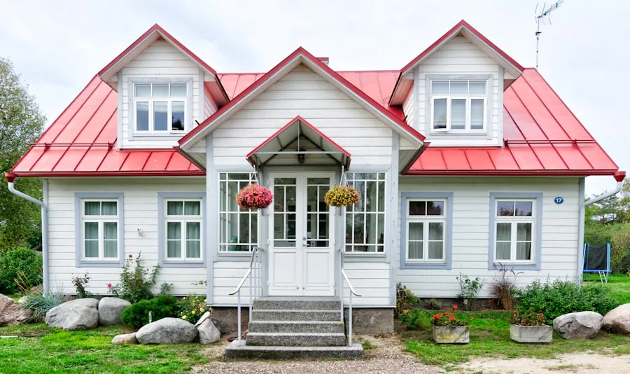 A cottage with hanging baskets on the porch